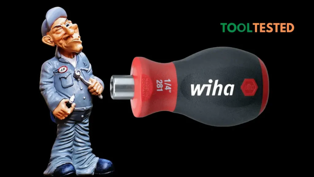  A Wiha screwdriver with a mechanic figurine, showing the tool in action.