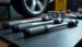 A close-up shot of three different torque wrenches laid out on a table, ready for a test in a workshop for a review of the best torque wrench in 2025.